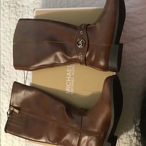 Brand new MK boots too small for daughter